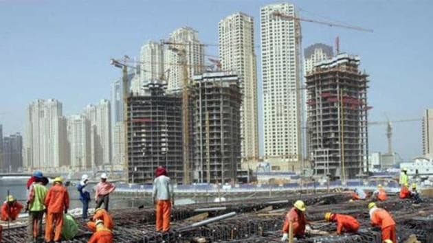 Workers working outside at a housing project site.(Reuters photo)