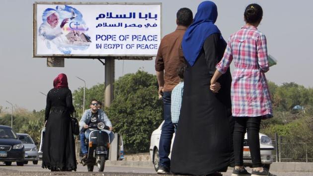A billboard welcomes Pope Francis, in Cairo, Egypt on April 27, 2017. Last week a Vatican team arrived in Cairo to make preparations for the pope’s security. Francis has chosen not to use a bulletproof vehicle to travel between engagements. (Amr Nabil/AP)