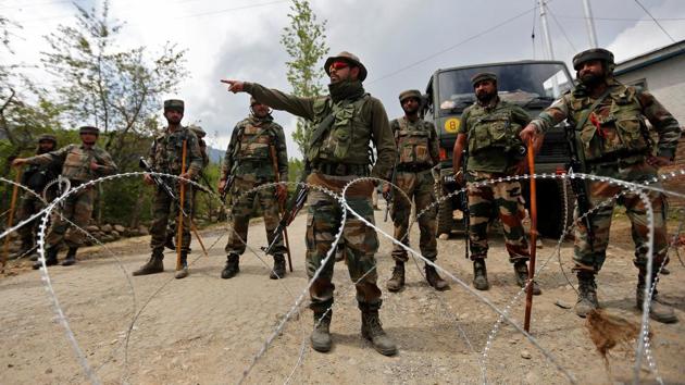 Indian army soldiers stand guard inside their army base after it was attacked by suspected separatist militants in Panzgam in Kashmir's Kupwara district. (REUTERS) Indian army soldiers stand guard inside their army base after it was attacked by suspected separatist militants in Panzgam in Kashmir's Kupwara district. (REUTERS)