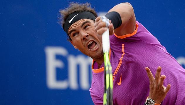 Rafael Nadal serves to South African Kevin Anderson during their ATP Barcelona Open match on Thursday.(AFP) Rafael Nadal serves to South African Kevin Anderson during their ATP Barcelona Open match on Thursday.(AFP)