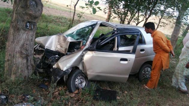 The car in which the family was travelling, at the accident spot in Baghapurana.(HT Photo)