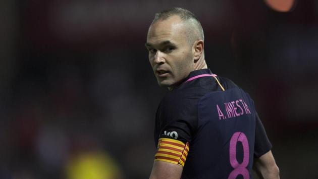 Andres Iniesta, who played for FC Barcelona in the El Clasico win against Real Madrid C.F. last week, is bothered by a right leg muscle injury. (AP) Andres Iniesta, who played for FC Barcelona in the El Clasico win against Real Madrid C.F. last week, is bothered by a right leg muscle injury. (AP)
