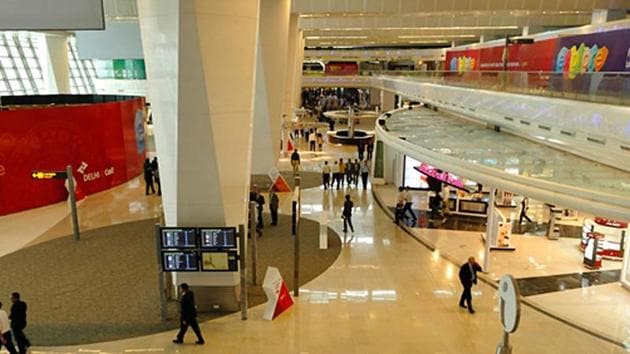 The departure lounge of T1 handles more passengers than it is designed for. A public accounts committee draft report says commercial establishments in T1, T3 set up ignoring CISF red flags.