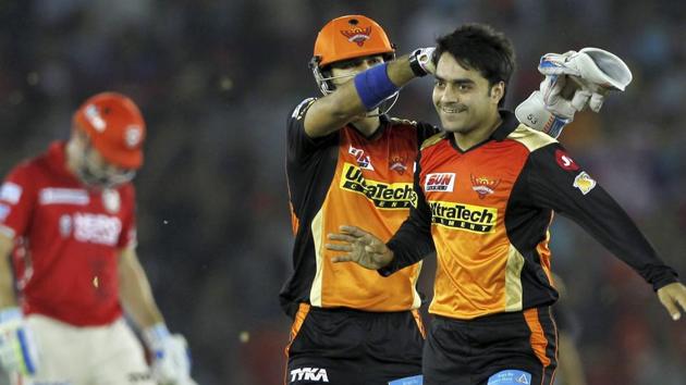 Sunrisers Hyderabad’s (SRH) Rashid Khan (right) celebrates the wicket of Eoin Morgan of Kings XI Punjab during their Indian Premier League (IPL) match in Mohali on Friday. (PTI) Sunrisers Hyderabad’s (SRH) Rashid Khan (right) celebrates the wicket of Eoin Morgan of Kings XI Punjab during their Indian Premier League (IPL) match in Mohali on Friday. (PTI)