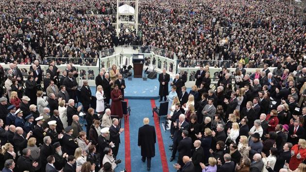 US President elect Donald Trump (C) arrives for the swearing-in ceremony on in front of the Capitol in Washington on January 20, 2017. (AFP)