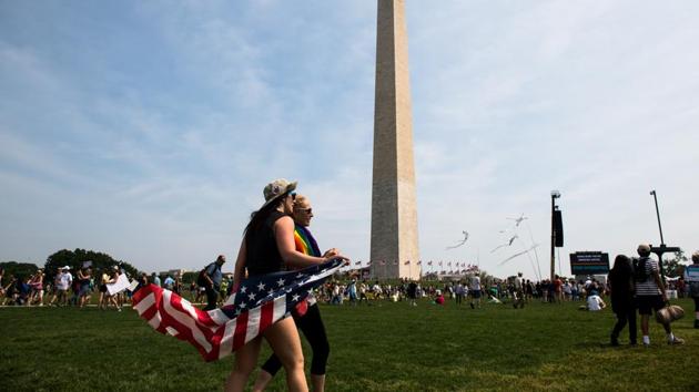 Attendees gather for the Peoples Climate March, on the National Mall in Washington. DiCaprio, who is a climate change activist, took to Twitter where the actor said the Climate March has “inspired” him to hope for a better future. (Hilary Swift/NYT)