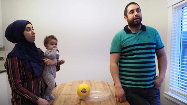 Lifelong Fort McMurray resident Bilal Abbas and his wife Lina Abousaid, in a rented home. Persistently low oil prices have forced companies to cut costs, and several have gone as far as to stop processing the region’s heavy crude and bitumen, which is more expensive and harder to extract than typical light crude. (Robyn Beck/AFP) Lifelong Fort McMurray resident Bilal Abbas and his wife Lina Abousaid, in a rented home. Persistently low oil prices have forced companies to cut costs, and several have gone as far as to stop processing the region’s heavy crude and bitumen, which is more expensive and harder to extract than typical light crude. (Robyn Beck/AFP)