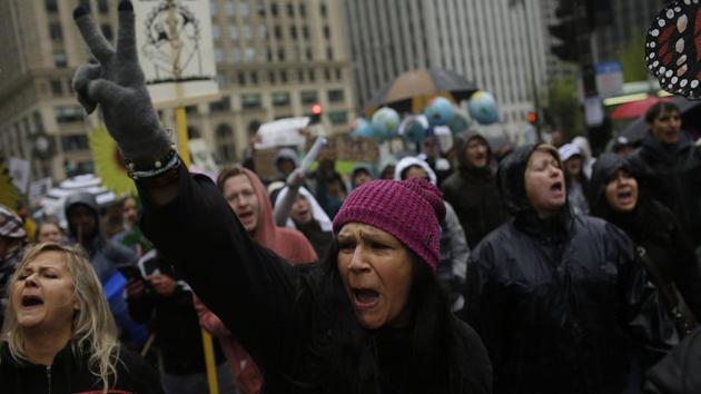 The march was part of an effort to build support for candidates with strong environmental records in the run-up to next year’s midterm elections and the 2020 presidential race, organizers said. (Joshua Lott/AFP)