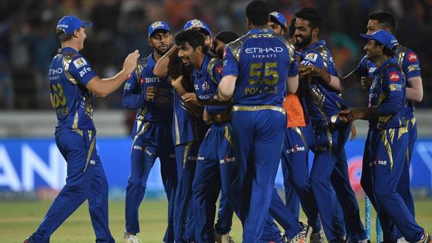 Mumbai Indians cricketers congratulates Jasprit Bumrah after their team defeated Gujarat Lions in a super over in the Indian Premier League (IPL) 2017 match.(AFP)