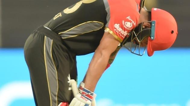 Royal Challengers Bangalore (RCB) captain Virat Kohli reacts in dejection after the fall of a wicket during the match against Rising Pune Supergiant in Pune on Saturday. (AFP) Royal Challengers Bangalore (RCB) captain Virat Kohli reacts in dejection after the fall of a wicket during the match against Rising Pune Supergiant in Pune on Saturday. (AFP)