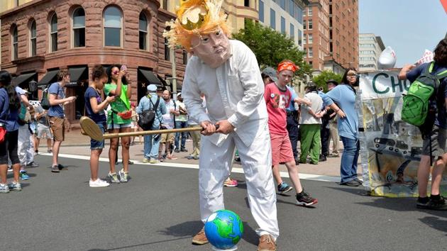 “Enjoy the day, enjoy the weather,” Trump, speaking to reporters ahead of a rally in Harrisburg, Pennsylvania commemorating his 100th day in office said when asked what he would tell those rallying on climate change. (Mike Theiler /REUTERS)