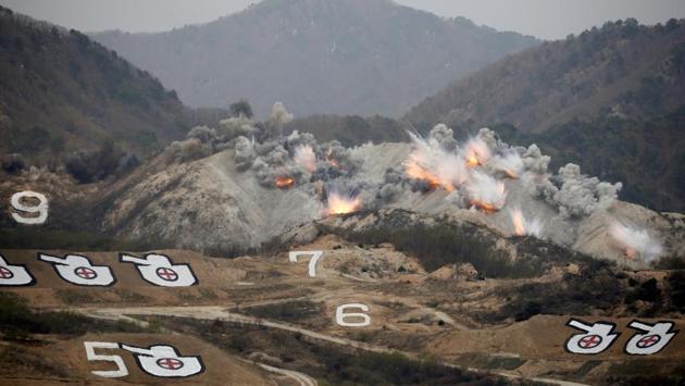 Explosions are seen at a target, during a U.S.-South Korea joint live-fire military exercise, at a training field, near the demilitarized zone, separating the two Koreas in Pocheon, South Korea April 21, 2017. Picture taken on April 21, 2017. (Kim Hong-Ji / REUTERS)