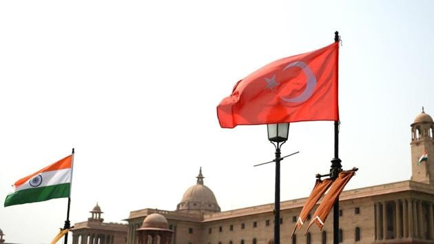 The national flags of India and Turkey fly on Rajpath ahead of an official visit by Turkish President Recep Tayyip Erdogan in New Delhi.(AFP)