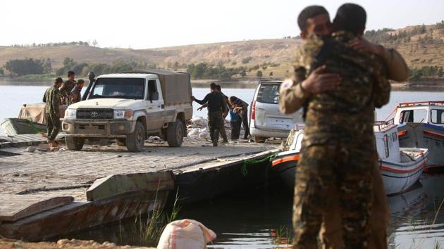 The US-backed force now controls more than 50 percent of the town, but has faced fierce resistance from IS, with the jihadists deploying suicide attackers, car bombs and weaponised drones. (Delil Souleiman/AFP) The US-backed force now controls more than 50 percent of the town, but has faced fierce resistance from IS, with the jihadists deploying suicide attackers, car bombs and weaponised drones. (Delil Souleiman/AFP)