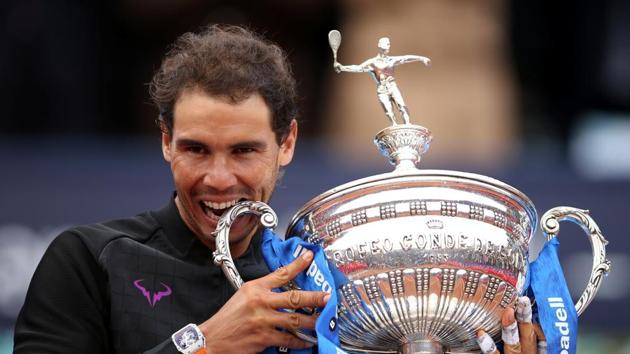 Rafael Nadal poses with the trophy after winning the Barcelona Open title. (REUTERS) Rafael Nadal poses with the trophy after winning the Barcelona Open title. (REUTERS)