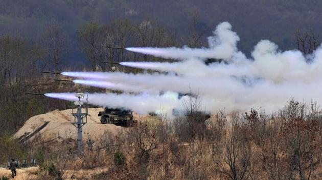 South Korean K-136 Kooryong 130mm 36-round multiple rocket launch system firing rockets during a media day presentation of a joint live firing drill between South Korea and the US at the Seungjin Fire Training Field in Pocheon, 65 kms northeast of Seoul. (JUNG Yeon-Je / AFP)