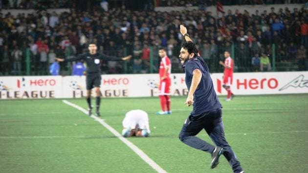 Aizawl FC coach Khalid Jamil invades the pitch after the final whistle of the match vs Shillong Lajong FC on Sunday, that sealed the club’s I-League championship. (AIFF) 