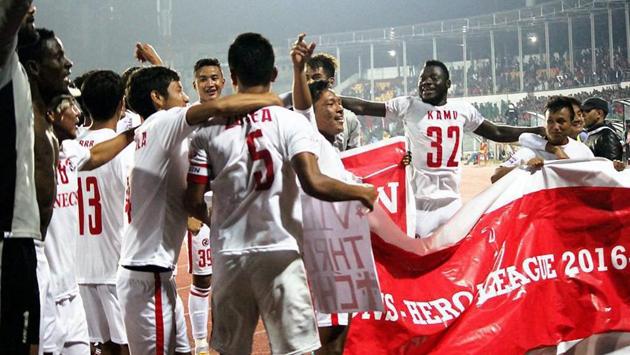 Aizawl FC players celebrate after they won the I-League title, following the 1-1 draw against Shillong Lajong FC in Shillong on Sunday.(PTI)