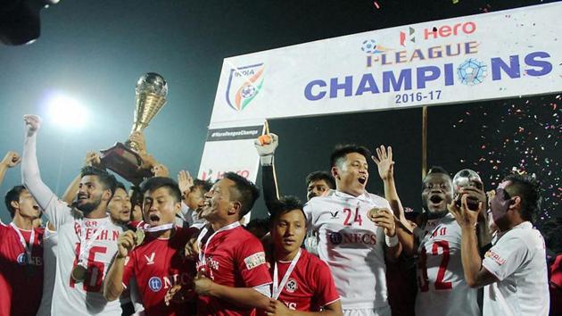 Aizawl FC players celebrate with the I-League trophy after they sealed the 2016-17 championship with a draw vs Shillong Lajong FC in Shillong on Sunday. (PTI)