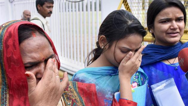 Family members of rape accused former UP cabinet minister Gayatri Prajapati returning from the Chief Minister Yogi Adityanath's residence in Lucknow on Monday after he refused to meet them.(PTI Photo) Family members of rape accused former UP cabinet minister Gayatri Prajapati returning from the Chief Minister Yogi Adityanath's residence in Lucknow on Monday after he refused to meet them.(PTI Photo)