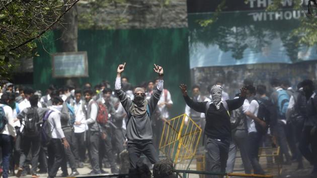 Kashmiri students shout slogans as they clash with police in Srinagar on April 24.(AP File Photo) Kashmiri students shout slogans as they clash with police in Srinagar on April 24.(AP File Photo)