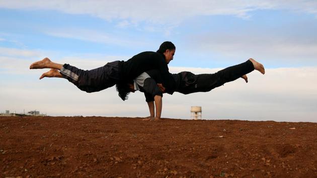 A group of about 15 have been practising Parkour for around two years, often in school courtyards and on quiet days when there is no fighting in the area. (Alaa Al-Faqir / Reuters) A group of about 15 have been practising Parkour for around two years, often in school courtyards and on quiet days when there is no fighting in the area. (Alaa Al-Faqir / Reuters)