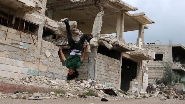 The teenagers film and photograph each other and upload the footage on Facebook. They even have an audience. (Alaa Al-Faqir / Reuters) The teenagers film and photograph each other and upload the footage on Facebook. They even have an audience. (Alaa Al-Faqir / Reuters)