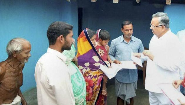 Chief Minister Raman Singh hands over appointment letter for the post of assistant sub inspector (ASI) of police to Jiteshwari, wife of CRPF martyr Banmali Yadav, who was killed in the recent Sukma attack, in Dhourasand village in Jashpur district on Monday.(PTI Photo) Chief Minister Raman Singh hands over appointment letter for the post of assistant sub inspector (ASI) of police to Jiteshwari, wife of CRPF martyr Banmali Yadav, who was killed in the recent Sukma attack, in Dhourasand village in Jashpur district on Monday.(PTI Photo)