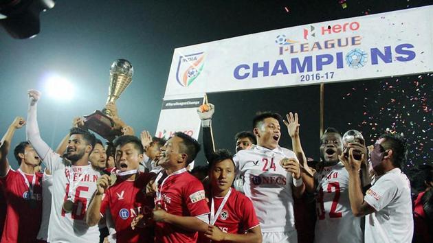 Players of the Aizawl Football Club poses with the trophy after they won the Hero I-League against Shillong Lajong FC, Shillong, April 30 (PTI)