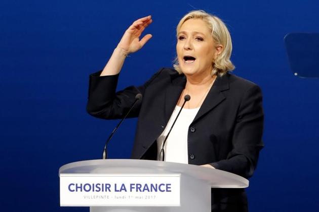National Front (FN) candidate Le Pen delivers a speech during a campaign rally in Villepinte, near Paris on Monday.(Reuters) National Front (FN) candidate Le Pen delivers a speech during a campaign rally in Villepinte, near Paris on Monday.(Reuters)