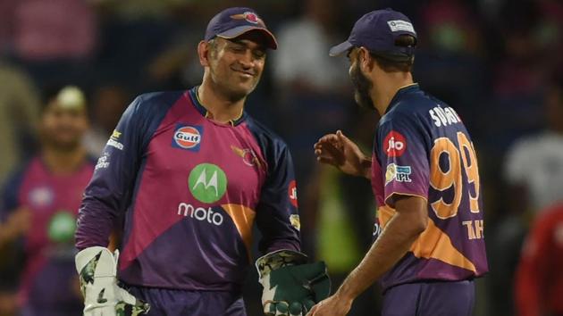 Rising Pune Supergiant cricketer Mahendra Singh Dhoni (L) is congratulated by teammate Imran Tahir after the run-out of Gujarat Lions batsman Dinesh Karthik. (AFP) Rising Pune Supergiant cricketer Mahendra Singh Dhoni (L) is congratulated by teammate Imran Tahir after the run-out of Gujarat Lions batsman Dinesh Karthik. (AFP)