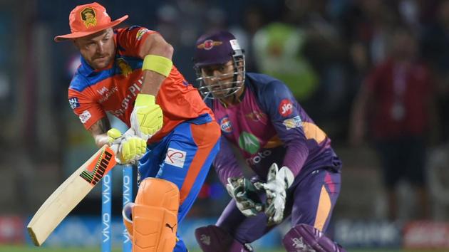 Gujarat Lions cricketer Brendon McCullum (L) is watched by Rising Pune Supergiants cricketer Mahendra Singh Dhoni as he plays a shot. (AFP) Gujarat Lions cricketer Brendon McCullum (L) is watched by Rising Pune Supergiants cricketer Mahendra Singh Dhoni as he plays a shot. (AFP)