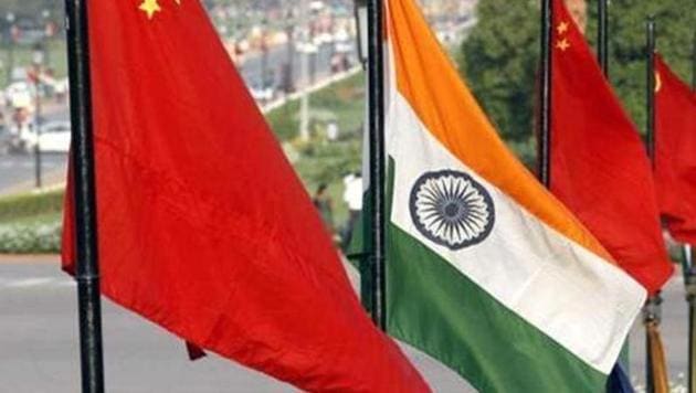 The national flags of China and India at Vijay Chowk on Rajpath. The Chinese state media has indicated that China appears not to “interfere” in the internal affairs of other countries but its investments, for example in the CPEC, gives Beijing the perfect cover to launch its diplomatic game.(HT File Photo)