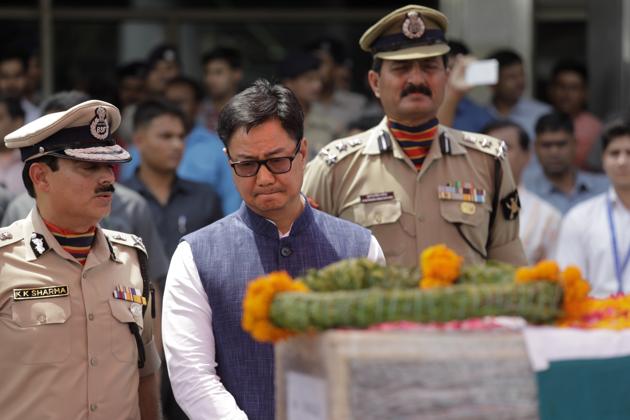 Border security Force or BSF Chief K K Sharma , left, talks to Junior Indian Home Minister Kiren Rijiju , centre, during a ceremony to pay tributes to BSF soldier Prem Sagar in New Delhi. Paramjit Kaur lamented that no senior functionary of the government had come to meet the family or attended the funeral. She also demanded that the Centre should give free hand to army so that Pakistan is taught a stern lesson. (Manish Swarup/AP) Border security Force or BSF Chief K K Sharma , left, talks to Junior Indian Home Minister Kiren Rijiju , centre, during a ceremony to pay tributes to BSF soldier Prem Sagar in New Delhi. Paramjit Kaur lamented that no senior functionary of the government had come to meet the family or attended the funeral. She also demanded that the Centre should give free hand to army so that Pakistan is taught a stern lesson. (Manish Swarup/AP)