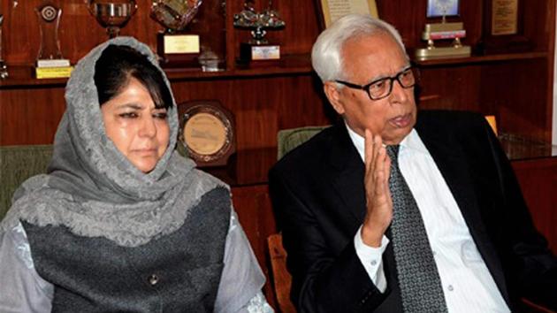 Jammu and Kashmir governor NN Vohra, seen here with chief minister Mehbooba Mufti, met Union home minister Rajnath Singh.(PTI File) Jammu and Kashmir governor NN Vohra, seen here with chief minister Mehbooba Mufti, met Union home minister Rajnath Singh.(PTI File)