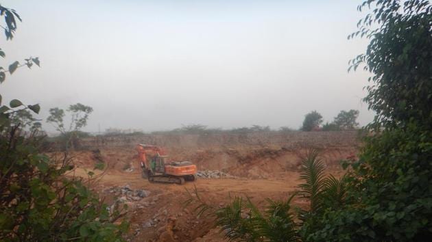Environmentalists allege illegal stone mining is being carried out in two acres on the Surajkund-Badkhal road in Faridabad. Environmentalists allege illegal stone mining is being carried out in two acres on the Surajkund-Badkhal road in Faridabad.