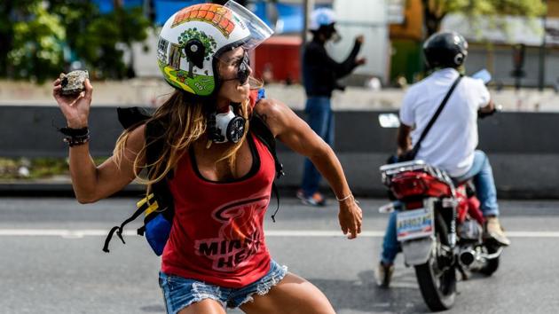 Venezuela’s socialist President Nicolas Maduro announced on Monday the creation of a new popular assembly with the ability to rewrite the constitution, which foes decried as a power-grabbing to stifle weeks of anti-government unrest. (FEDERICO PARRA / AFP)