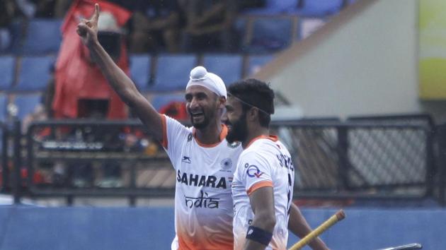 Indian hockey team striker Mandeep Singh celebrates after scoring against Japan hockey team during their match at the Sultan Azlan Shah Cup tournament in Ipoh, Malaysia, on Wednesday. (Hockey India) Indian hockey team striker Mandeep Singh celebrates after scoring against Japan hockey team during their match at the Sultan Azlan Shah Cup tournament in Ipoh, Malaysia, on Wednesday. (Hockey India)