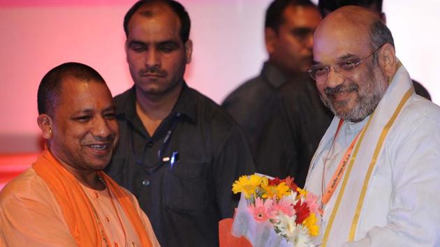 BJP chief Amit Shah being welcomed by chief minister Yogi Adityanath in Lucknow on Tuesday. (Subhankar Chakraborty/HT Photo) BJP chief Amit Shah being welcomed by chief minister Yogi Adityanath in Lucknow on Tuesday. (Subhankar Chakraborty/HT Photo)