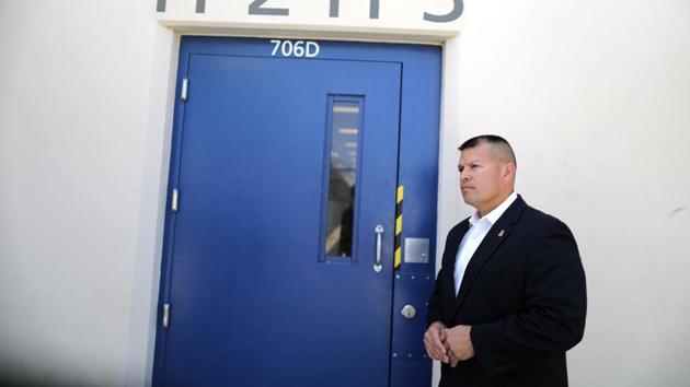 David A. Marin, Field Office Director, Enforcement and Removal Operations, stands at the entrance to the Adelanto immigration detention center. (Lucy Nicholson /Reuters)