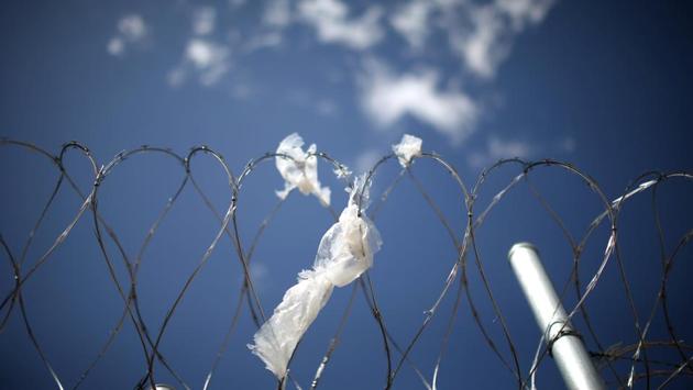 A wire fence surrounds the center. A razor wire fence rings Adelanto, which is run by Geo Group Inc, a Florida-based company that owns, leases and manages correctional and detention facilities. (Lucy Nicholson /Reuters)