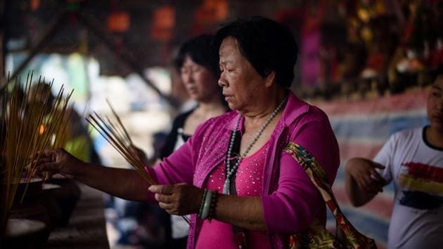 The whole event harks back to the 19th century, when Cheung Chau was struggling to combat a plague and pirate raids. (Anthony Wallace/AFP) 