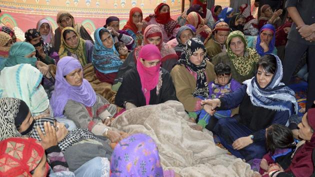 Jammu and Kashmir chief minister Mehbooba Mufti visits the family of JK Bank employee who was killed by the suspected militants during their cash van loot, in Kulgam district of south Kashmir on Wednesday. (PTI) Jammu and Kashmir chief minister Mehbooba Mufti visits the family of JK Bank employee who was killed by the suspected militants during their cash van loot, in Kulgam district of south Kashmir on Wednesday. (PTI)