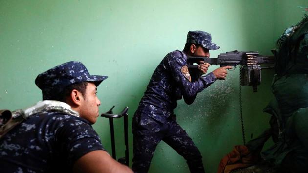 Islamic State is influencing some youth in India to join Jihad even as it loses territory in Syria and Iraq. In this picture, Iraqi Federal Police clash with the IS fighters in western Mosul on Tuesday.
