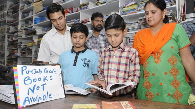 A notice informing about non-availability of Punjab school textbooks at a shop in Patiala.(Bharat Bhushan/HT Photo)