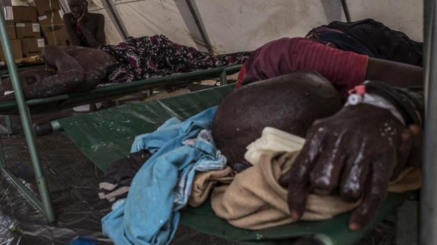 The disease is spread via food or water contaminated with the faeces or vomit of someone carrying the disease, a particular risk in overcrowded areas such as refugee camps. Its victims can die an agonising death. (AFP)
