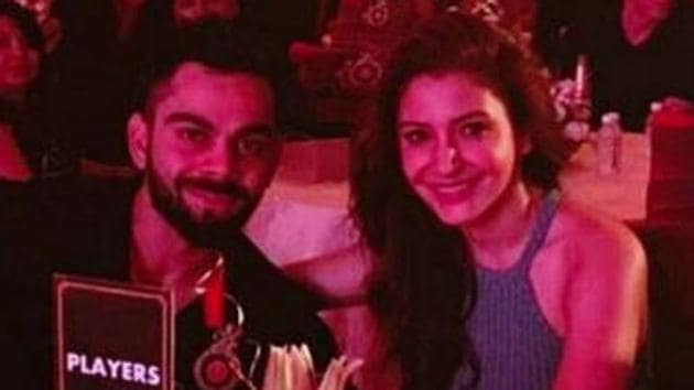 Virat Kohli accompanied by girlfriend Anushka Sharma at RCB 10-year celebration.