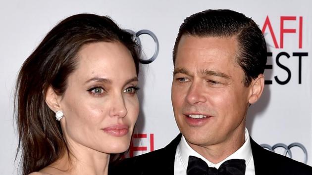 This file photo taken on November 4, 2015 shows actor/director Angelina Jolie Pitt (L) and her estranged husband actor Brad Pitt.(AFP)