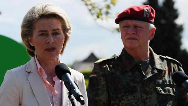 German defence minister Ursula von der Leyen and inspector general of the German armed forces Bundeswehr, Volker Wieker (right), during a news conference in eastern France on May 3, 2017. Von der Leyen has scrapped a US trip to deal with a scandal over a far-right soldier who allegedly plotted an attack while posing as a Syrian refugee. (AFP) German defence minister Ursula von der Leyen and inspector general of the German armed forces Bundeswehr, Volker Wieker (right), during a news conference in eastern France on May 3, 2017. Von der Leyen has scrapped a US trip to deal with a scandal over a far-right soldier who allegedly plotted an attack while posing as a Syrian refugee. (AFP)