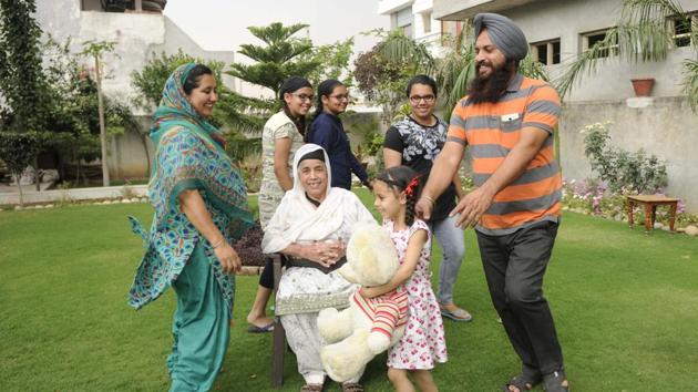 Businessman Amritpal Singh Sodhi and his wife Gurwinder Kaur (left) with their four daughters in Fatehgarh Sahib. (Bharat Bhushan/HT Photo) Businessman Amritpal Singh Sodhi and his wife Gurwinder Kaur (left) with their four daughters in Fatehgarh Sahib. (Bharat Bhushan/HT Photo)